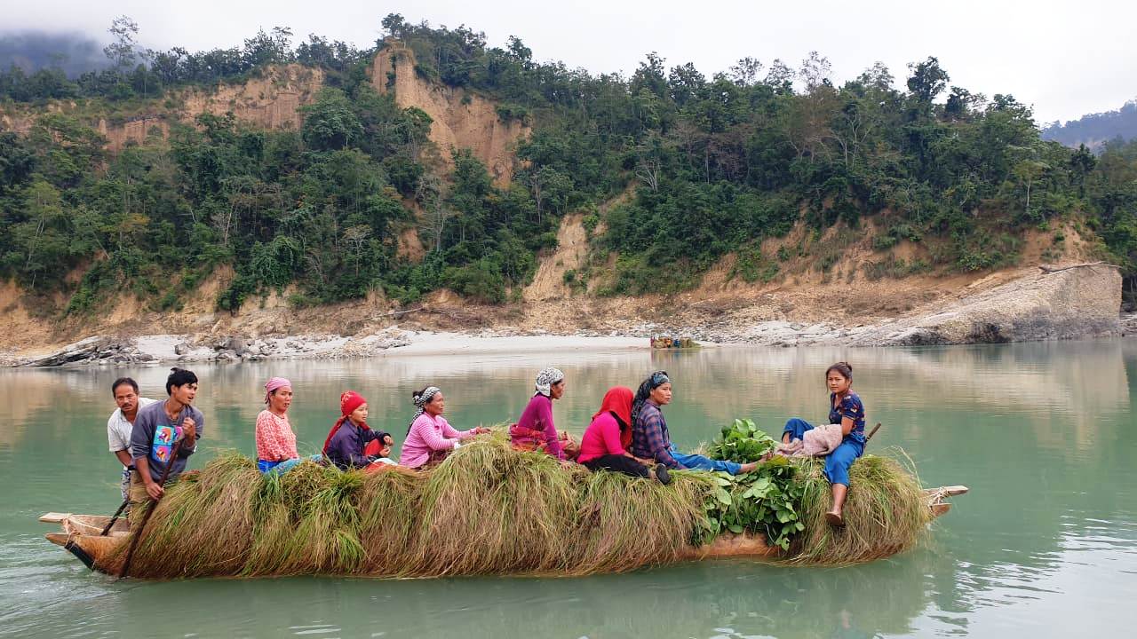 A group of women returning back home after cutting fodder for their livestock | Karnali River, Chaukune Rural Municipality | Photo by: Prabin Kumar Rawat